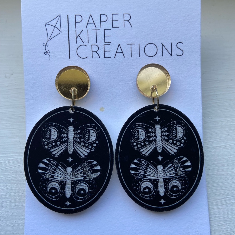 Chic Black and White Butterfly Earrings with Gold Accents